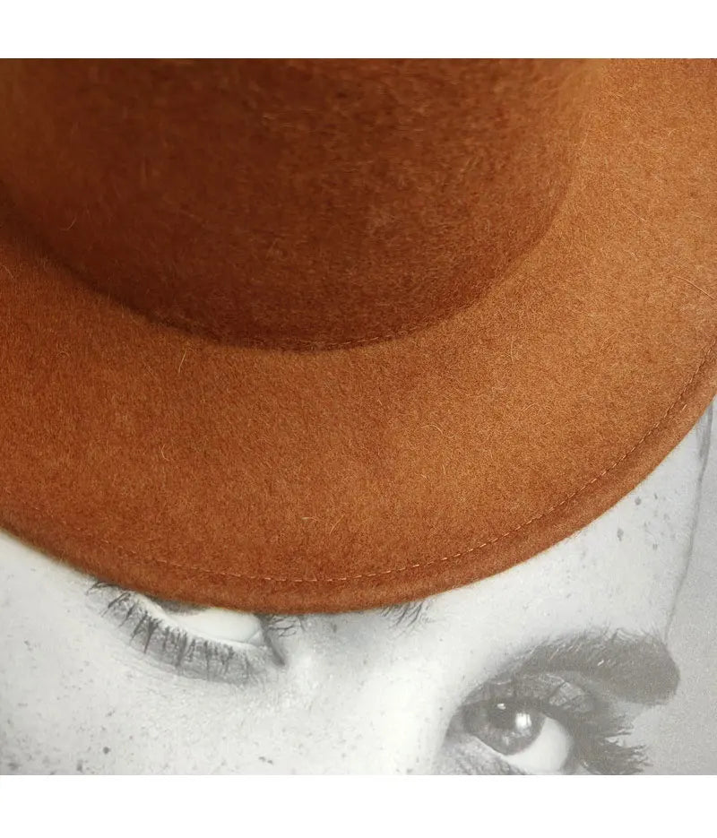 Close-up of a brown hat with a blurred background