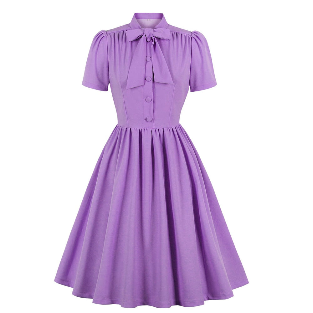 Bow Tie Neck Button Up Pleated Voyage Dress